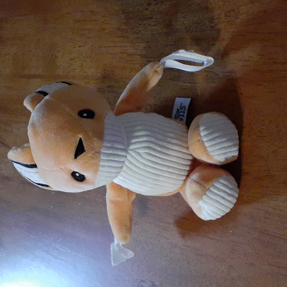 Dr. Brown's squirrel plush with hook and loop attachments on paws